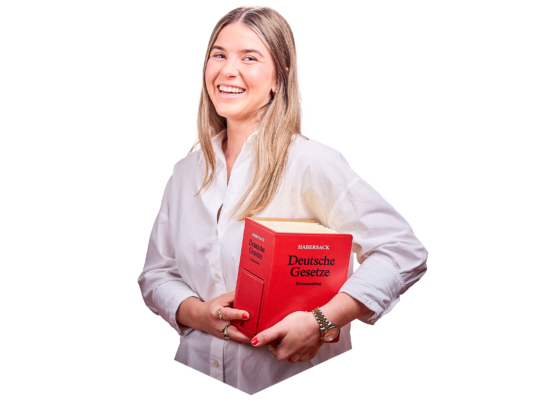 Eine Frau mit langen blonden Haaren lächelt in die Kamera und hat das rote deutsche Gesetzbuch in der Hand.