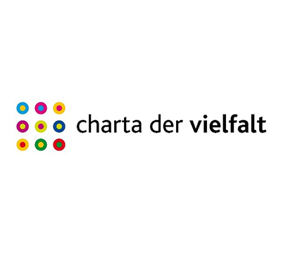 Logo vom Zertifikat charta der Vielfalt mit ganz vielen bunten Punkten.
