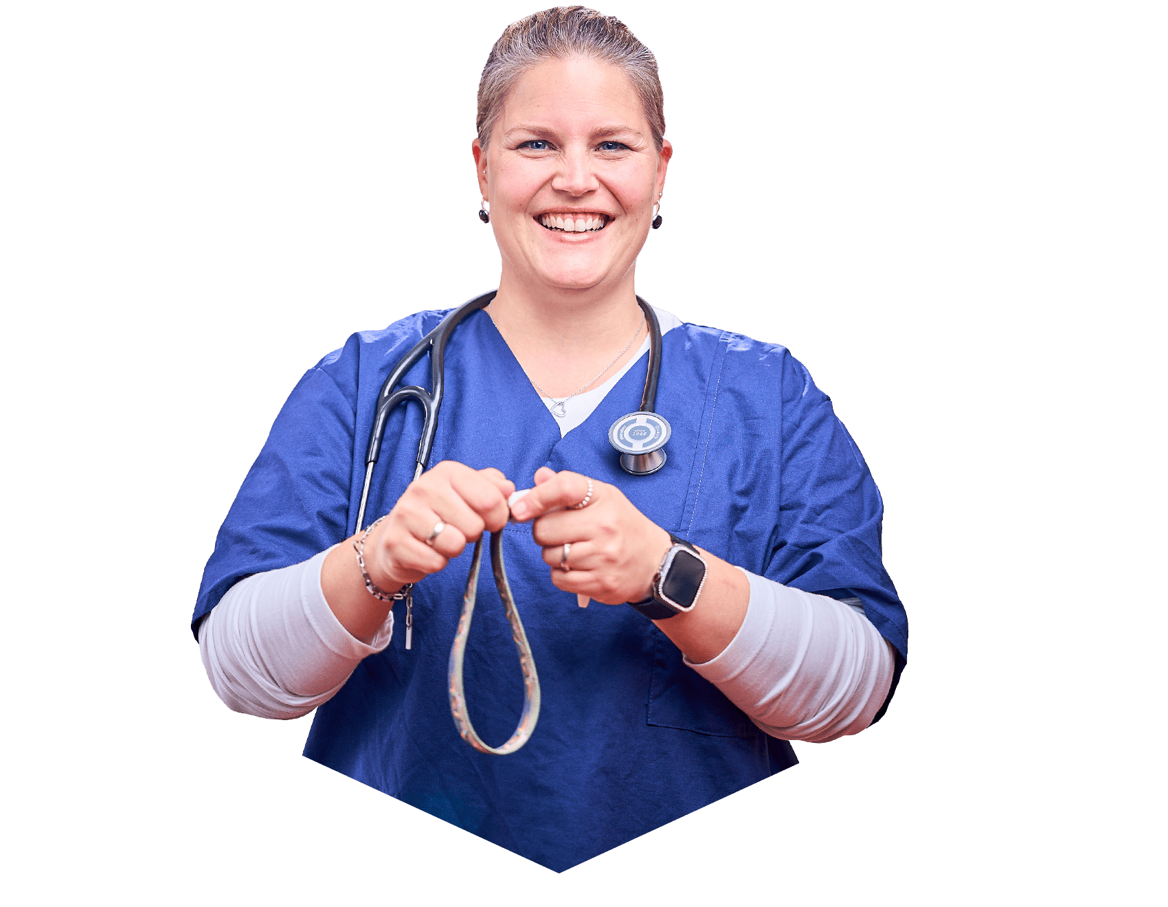 Lächende Ärztin mit blauen Kittel und einem Stethoskop um den Hals